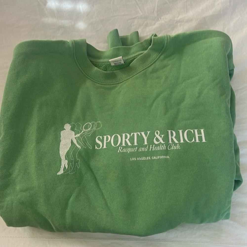 Sporty & Rich “Racquet & Health Club” sweatshirt.